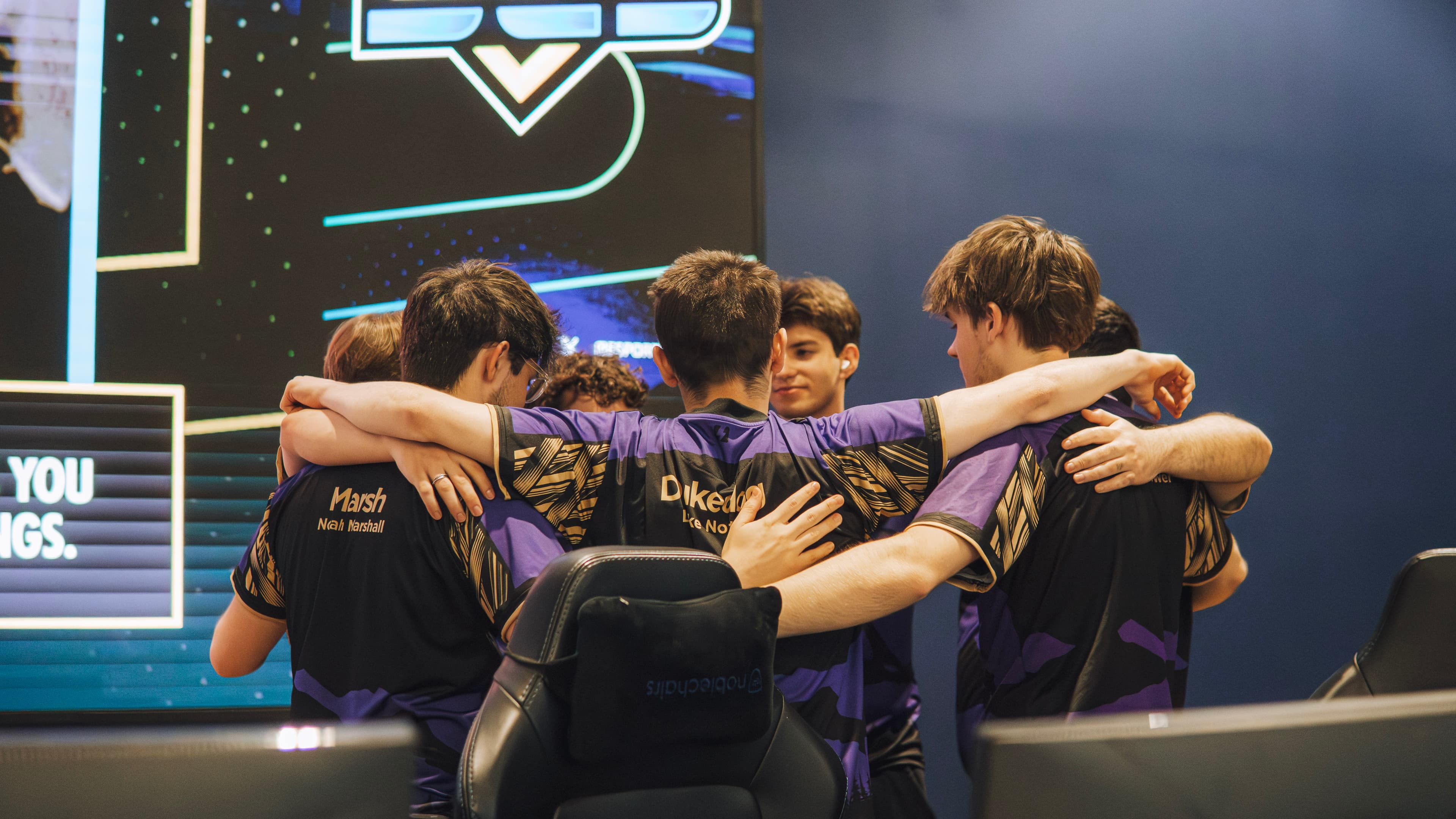 NEL team in a pre-match huddle at a championship event